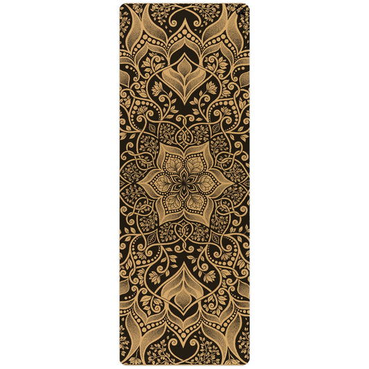 Decorative mat with intricate gold pattern on a black background
